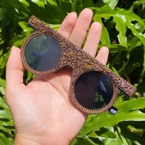 Sun glasses. They’re beautiful and very sparkly